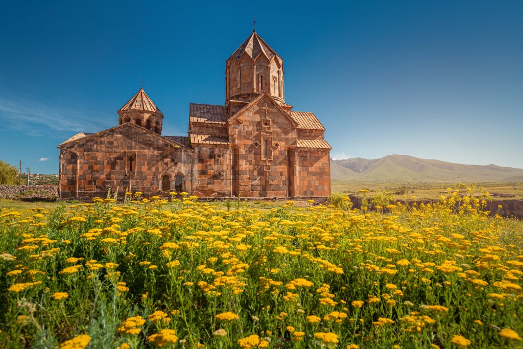 Temple in a flower field in Armenia