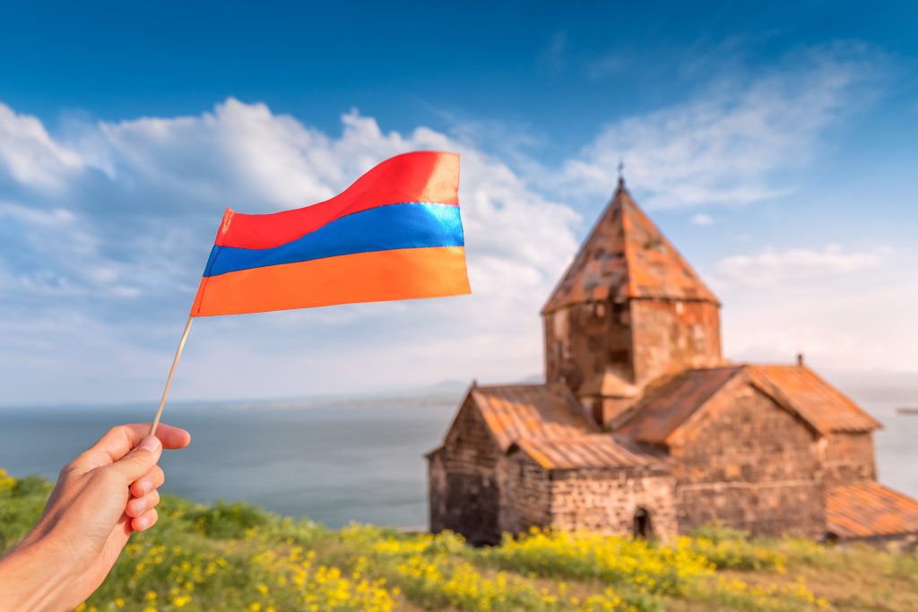 Armenian flag and temple in the background